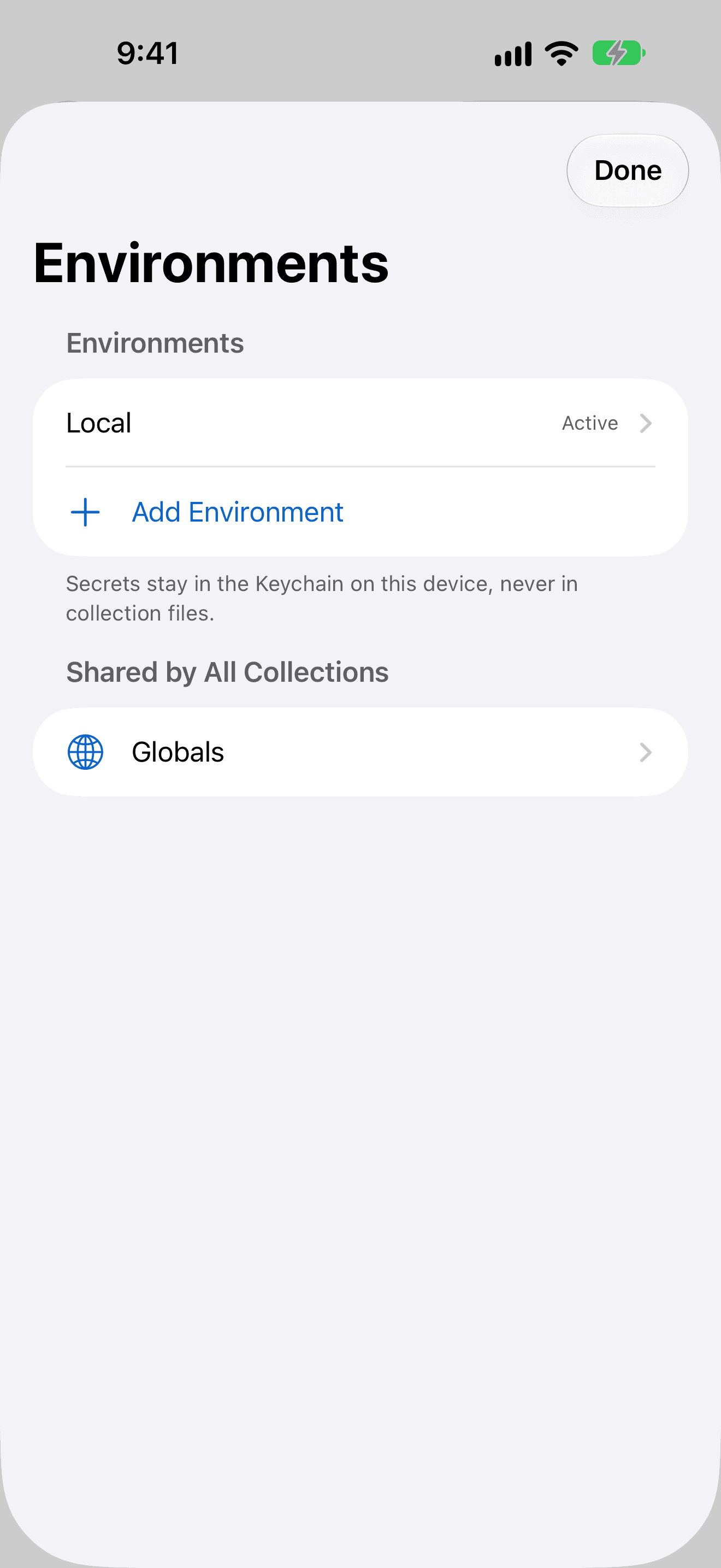 RequestPad on iPhone: the Environments sheet with the Local environment active, shared Globals, and a note that secrets stay in the Keychain.